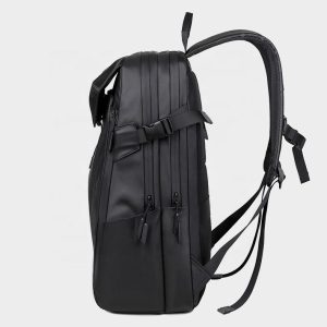 Waterproof travel backpack with luggage strap side view of black backpack