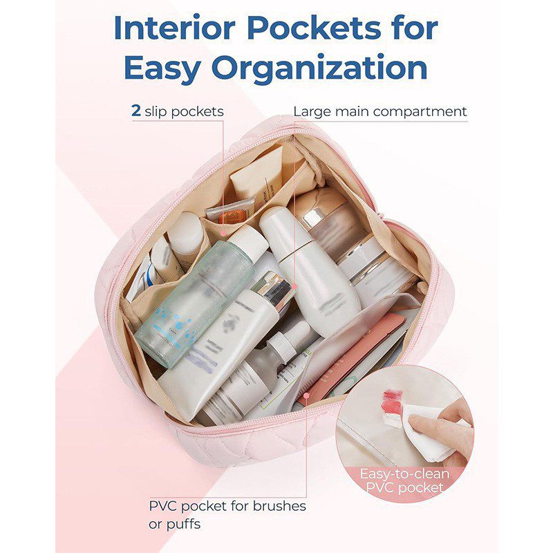 An open pink bag showing the large main compartment holding bottles two slip pockets and a PVC pocket with a hand wiping it clean.