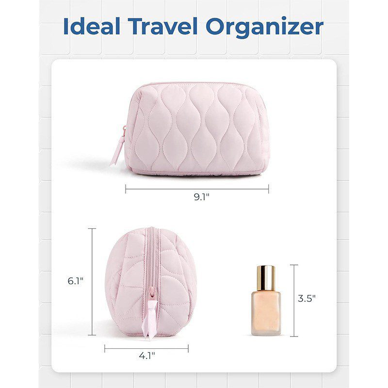 A dimension diagram showing the pink bag measurements of 9.1 by 6.1 by 4.1 inches next to a small perfume bottle.