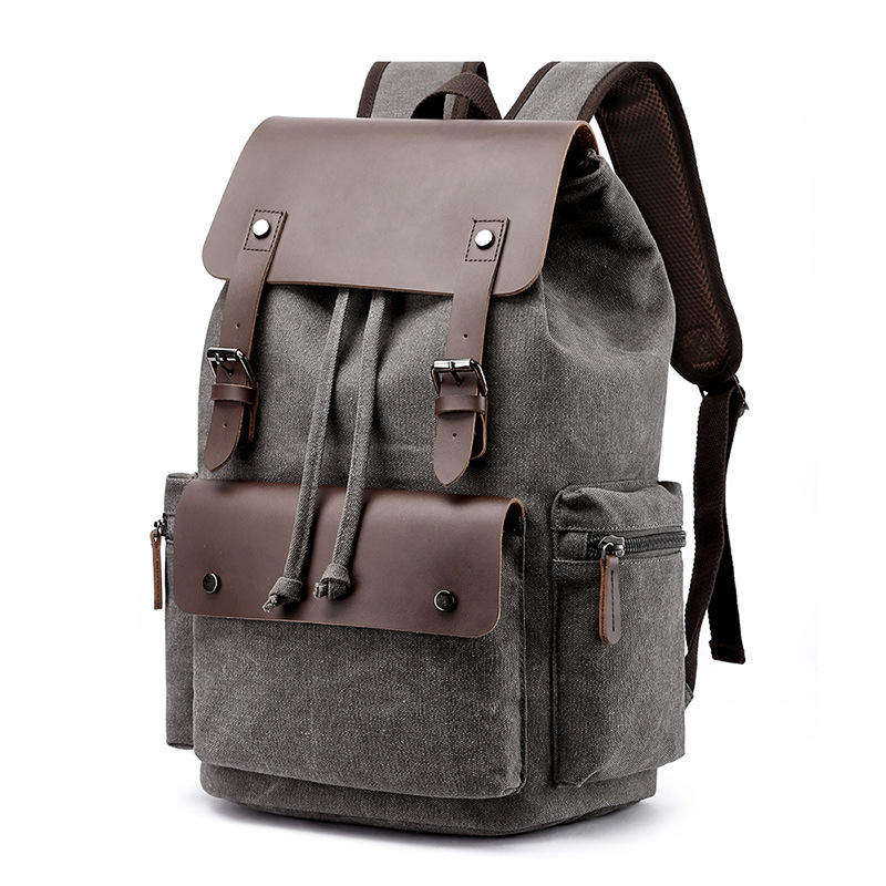 05 e gray Vintage style meets modern function . this 16A washed canvas backpack features a microfiber leather flap, drawstring closure, and a 36-55L capacity that fits a 15 inch laptop . Available in 6 colors ,perfect for commuting and college.