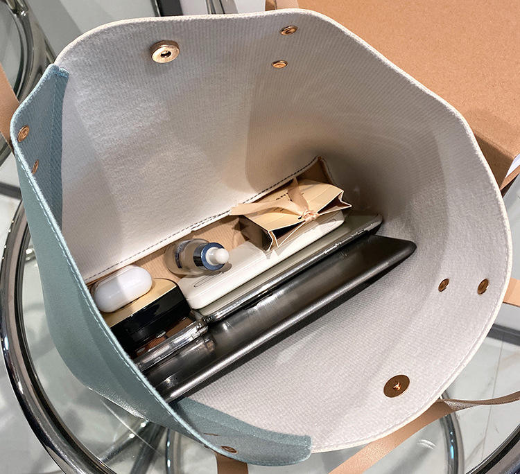 05 Interior view of the spacious tote bag holding daily essentials