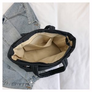open image of the black puffer tote bag 